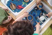 Students playing with ocean-themed toys