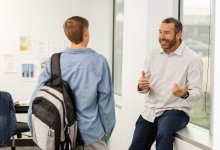 A teacher and student having a positive conversation
