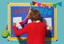 photo of a teacher taking down a bulletin board after the last day of school