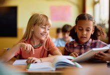 Two elementary students working together on an assignment