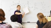 Math teacher at the front of the class