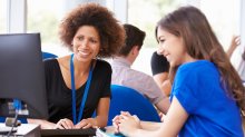 A student and teacher discussing a potential deadline extension