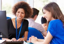 A student and teacher discussing a potential deadline extension