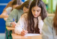 Middle school students taking a test