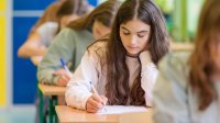 Middle school students taking a test