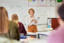 A teacher talking to her classroom