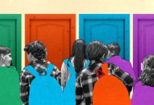 A group of elementary students approaching doors that are different colors