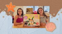 Two students with their project on saving sea animals