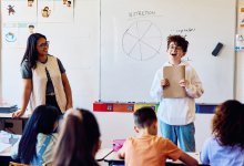 A middle school student passionately presenting on nutrition to his peers