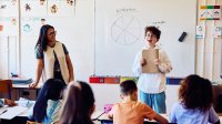 A middle school student passionately presenting on nutrition to his peers