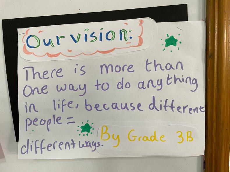 Student artwork reading "Our Vision: There is more than one way to do anything in life, because different people = different ways."