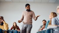 A teacher modeling a lesson method to other teachers