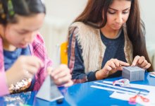 Middle school students making crafts in school