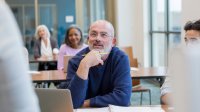 A high school teacher participating in a college course