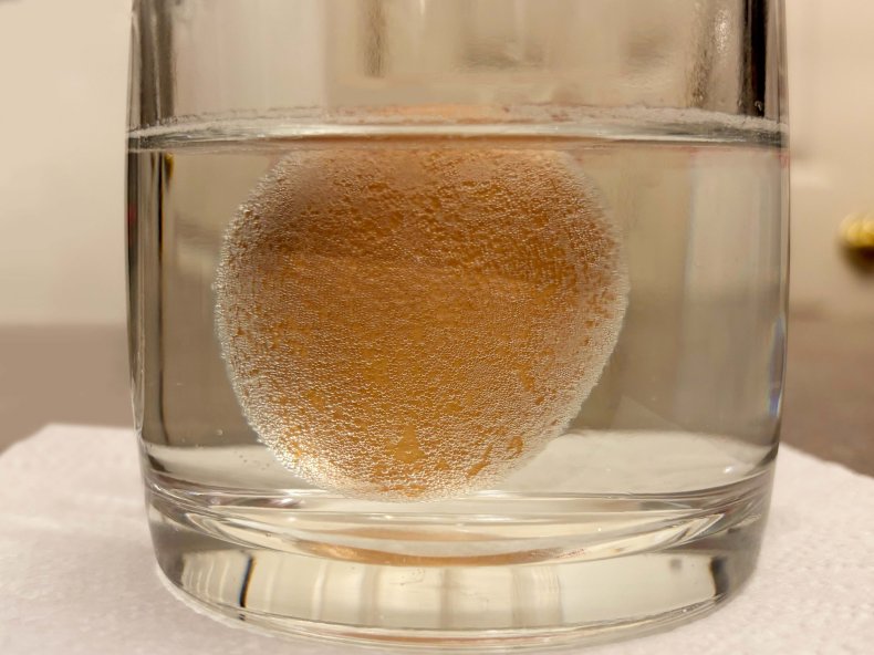An egg dunked in vinegar